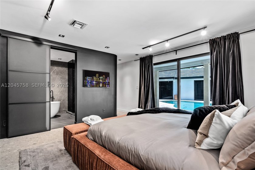 Featured on Netflix's Designing Miami, this fully renovated - photo 23