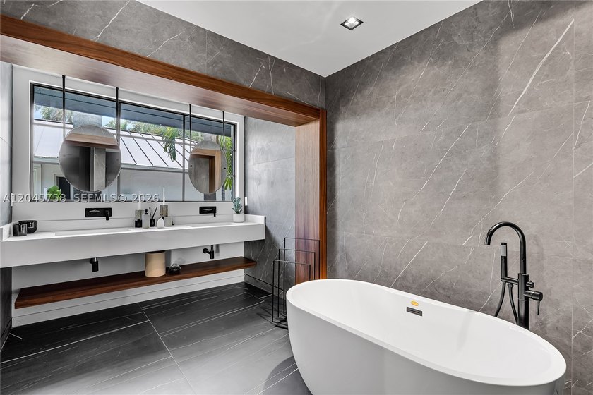 Featured on Netflix's Designing Miami, this fully renovated - photo 29