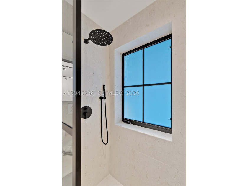 Featured on Netflix's Designing Miami, this fully renovated - photo 38