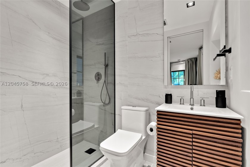 Featured on Netflix's Designing Miami, this fully renovated - photo 45
