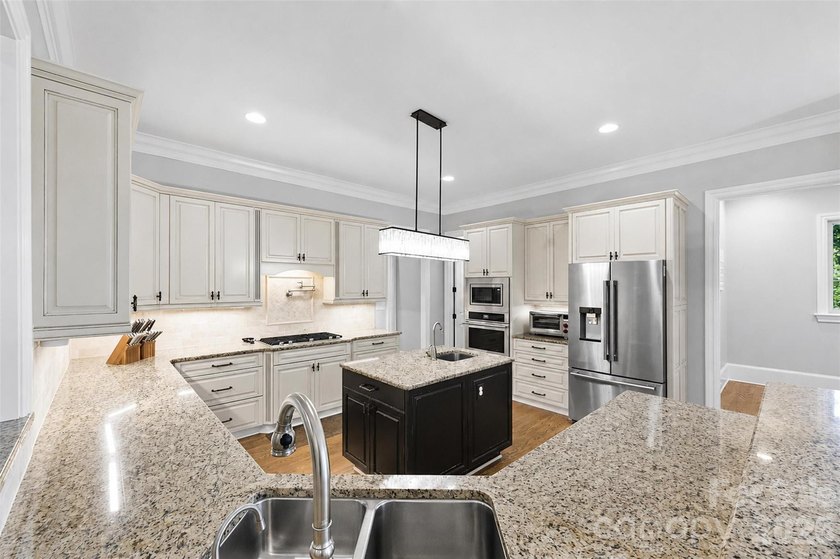 Located in the highly sought-after gated community of Cramer - photo 14