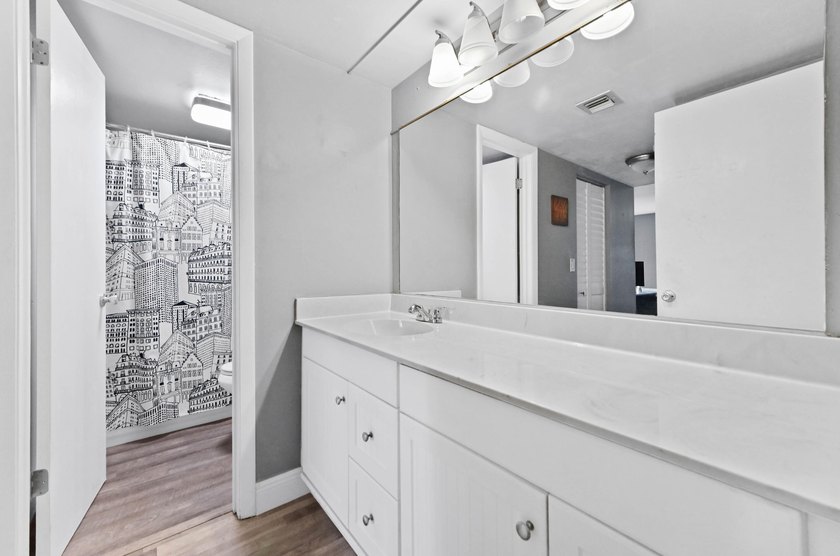 Discover this charming 2-bedroom, 2-bathroom ground floor - photo 16
