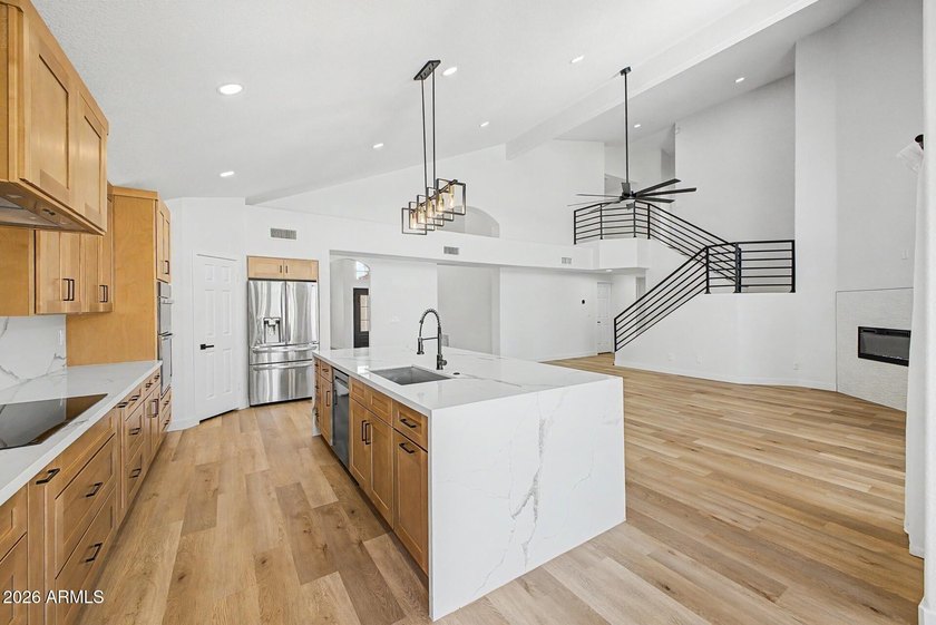 Discover luxury living at its finest in this beautifully updated - photo 3