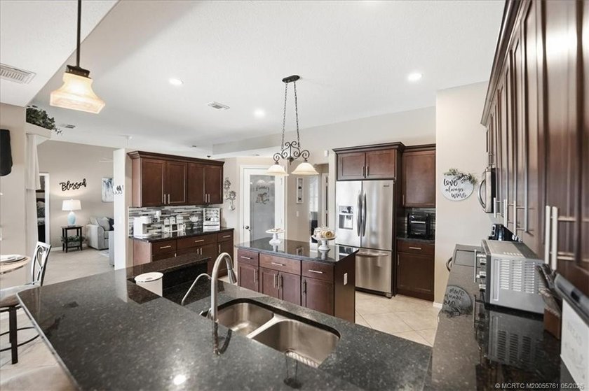 Welcome to this stunning 3 bedroom, 2.5 baths POOL home at - photo 46