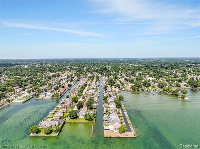 Welcome home to this updated, canal-front, brick ranch, with - photo 3