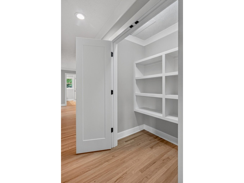 Completely remodeled and move-in ready! This beautiful brick - photo 19