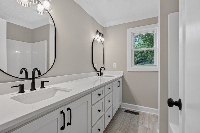 Completely remodeled and move-in ready! This beautiful brick - photo 23