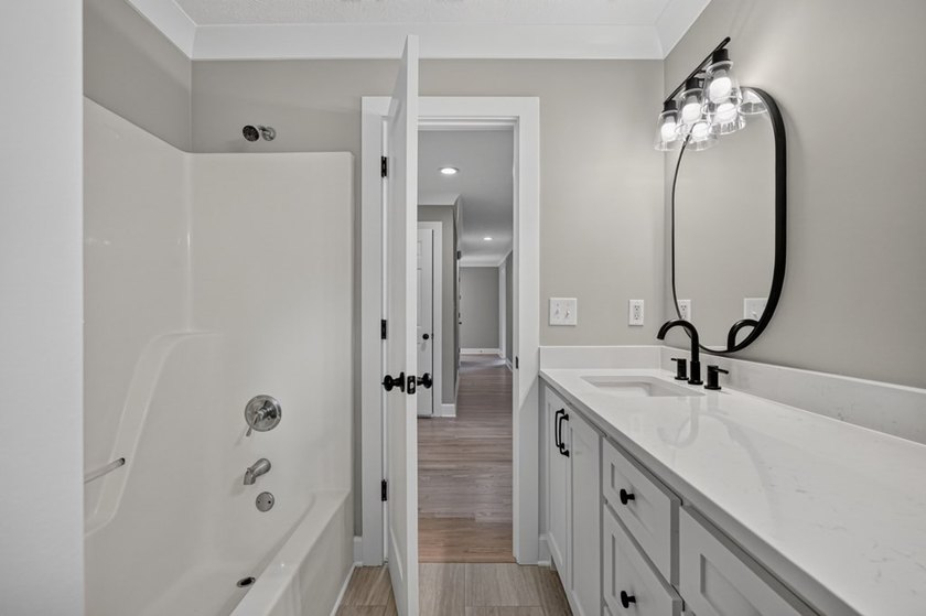 Completely remodeled and move-in ready! This beautiful brick - photo 24