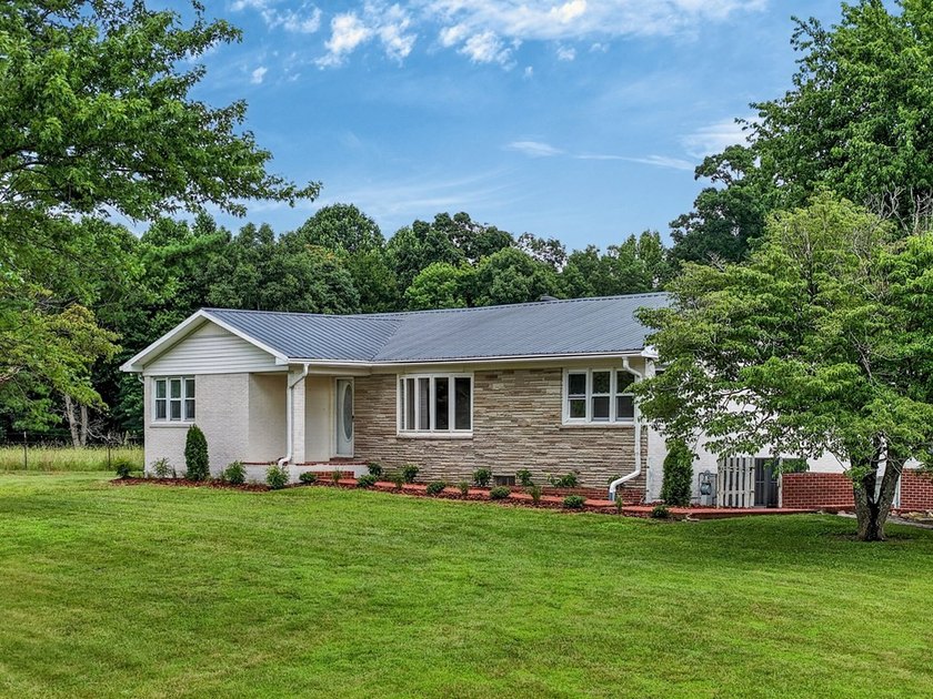 Completely remodeled and move-in ready! This beautiful brick - photo 35