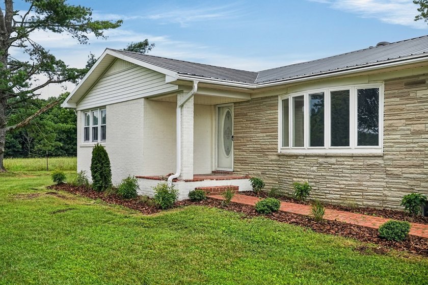 Completely remodeled and move-in ready! This beautiful brick - photo 42