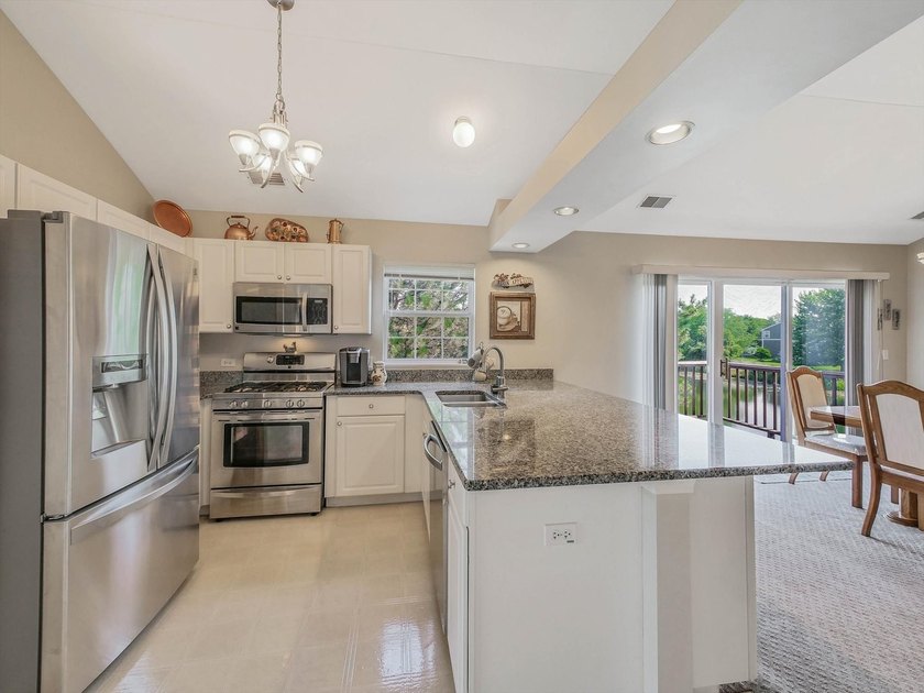 Rare Pond-View Ranch Townhome | Premium End-Unit | Sunset Deck | - photo 4