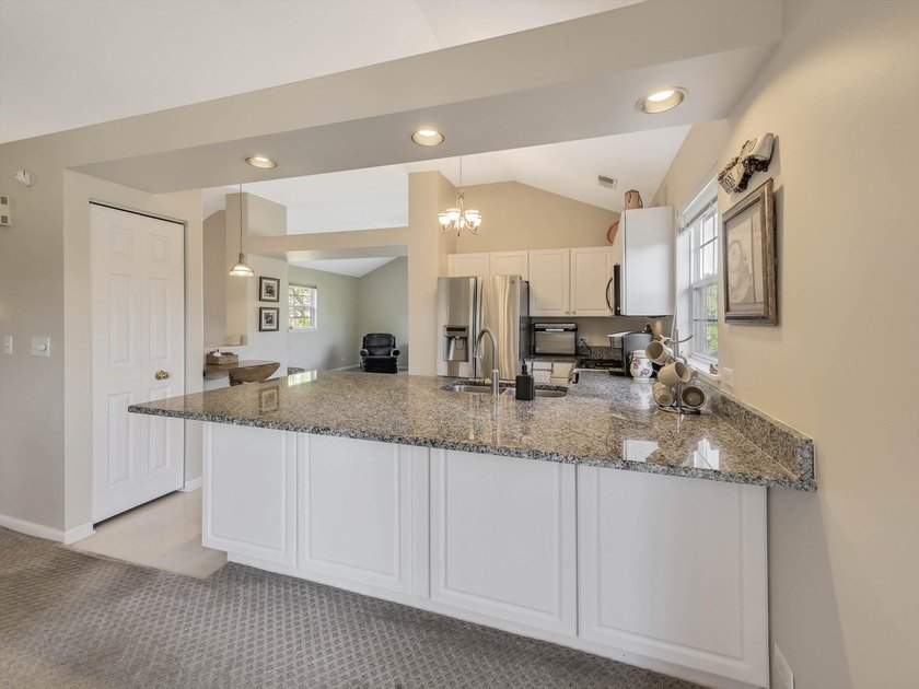 Rare Pond-View Ranch Townhome | Premium End-Unit | Sunset Deck | - photo 9