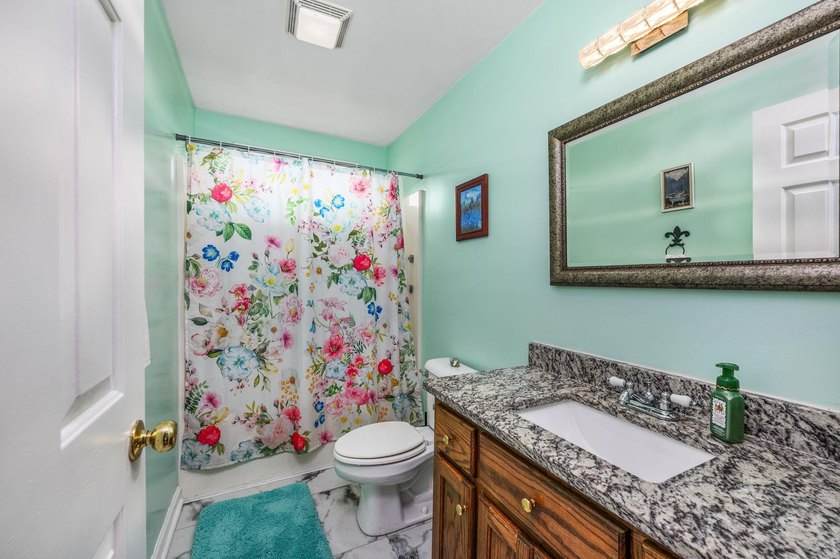 NO HOA, a fenced backyard overlooking the pond, and an updated - photo 14