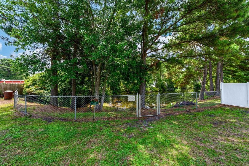 NO HOA, a fenced backyard overlooking the pond, and an updated - photo 19