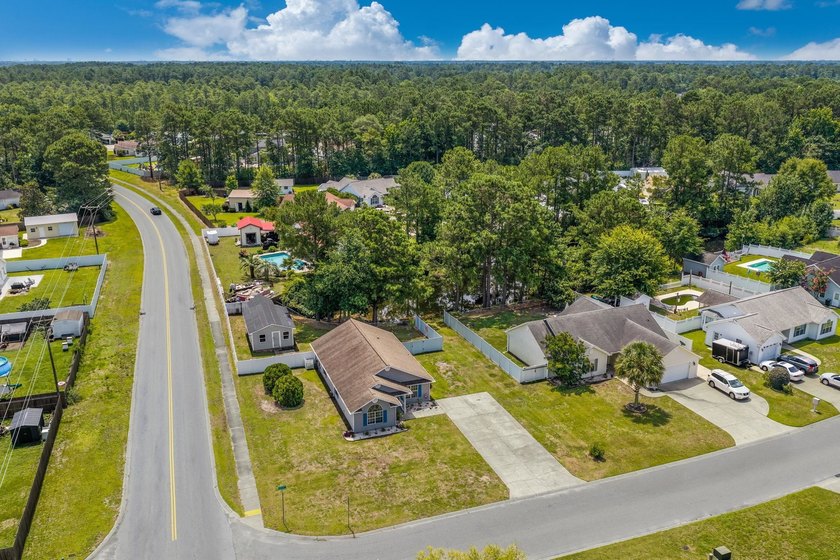 NO HOA, a fenced backyard overlooking the pond, and an updated - photo 33