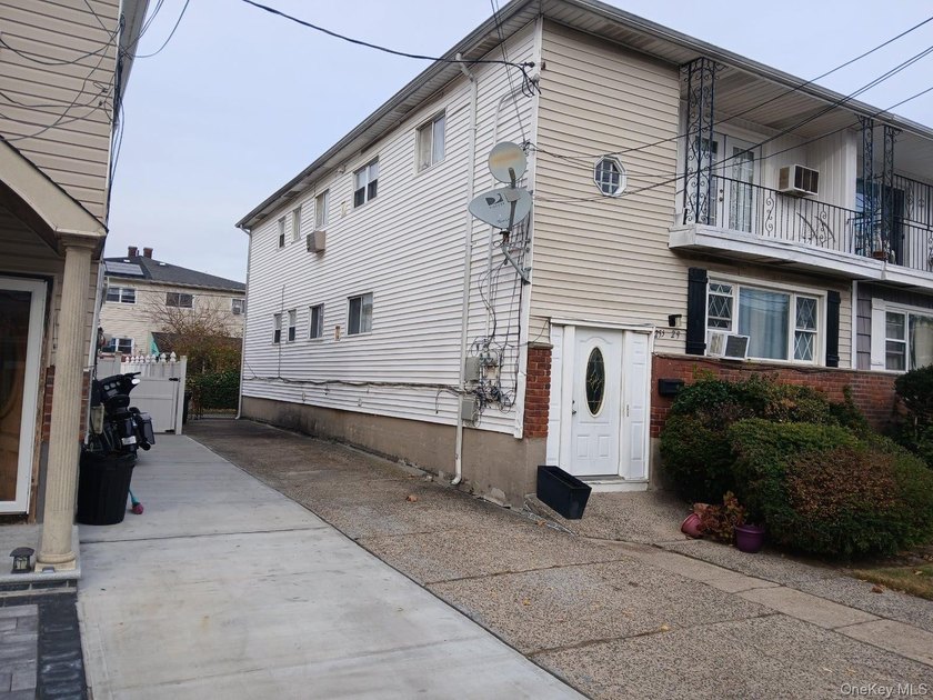 This is a charming two-family home that offers great potential - photo 3