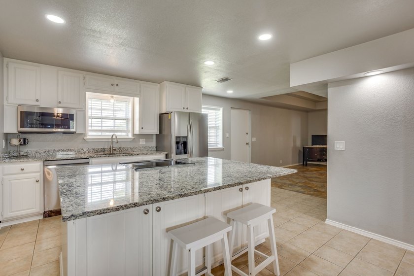 Stunning custom brick home on acreage with the rare combination - photo 11