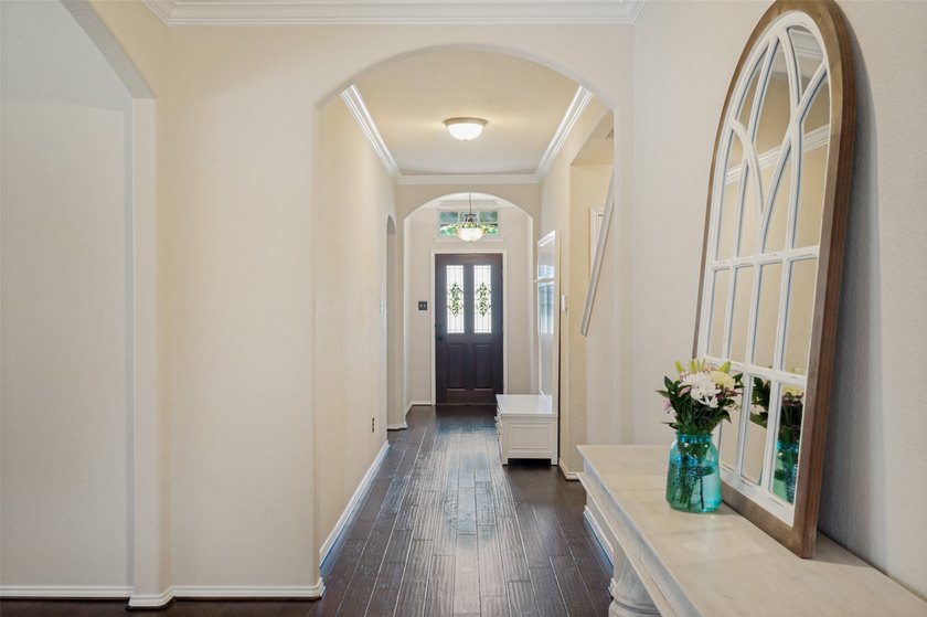 Beautiful 1.5-story home in a gated community just blocks from - photo 2