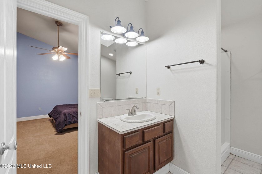 Welcome home to this spacious 4BR/2BA residence offering the - photo 13