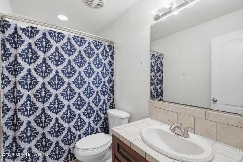 Welcome home to this spacious 4BR/2BA residence offering the - photo 18
