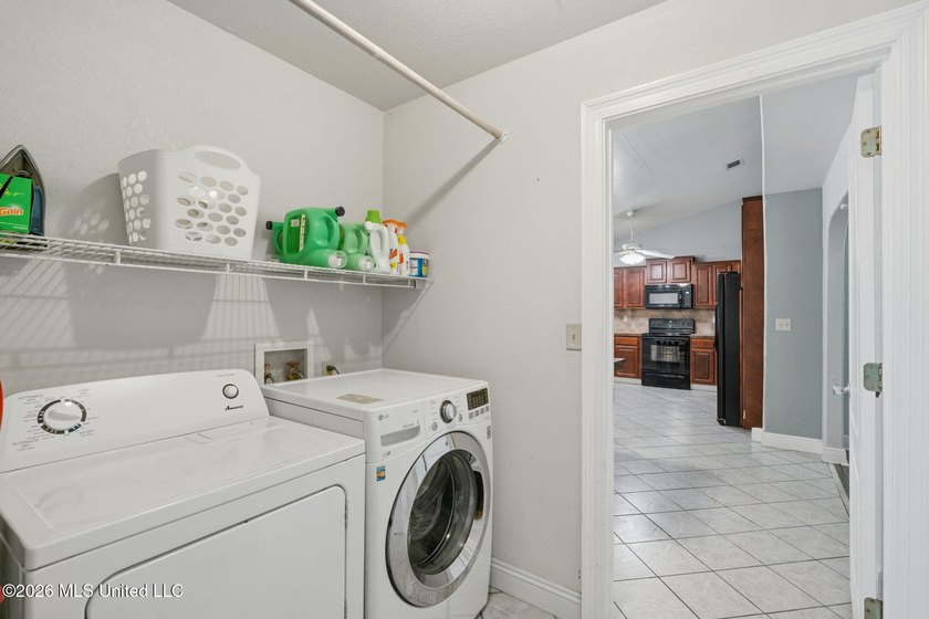 Welcome home to this spacious 4BR/2BA residence offering the - photo 22
