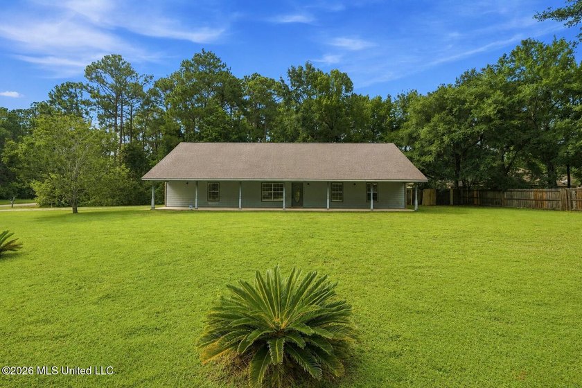 Welcome home to this spacious 4BR/2BA residence offering the - photo 25