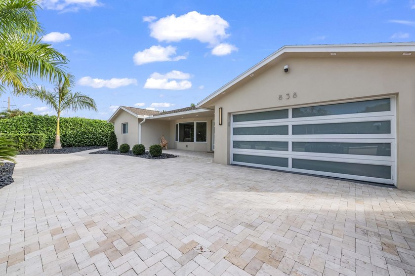 Step into this stunningly reimagined home, where modern elegance - photo 2