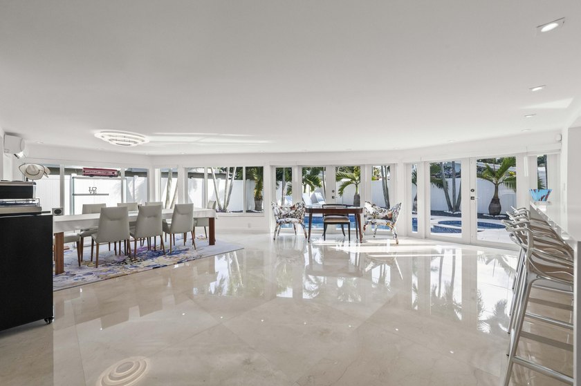 Step into this stunningly reimagined home, where modern elegance - photo 8