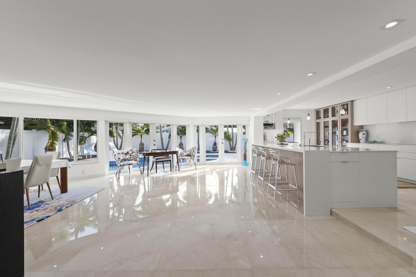 Step into this stunningly reimagined home, where modern elegance - photo 9