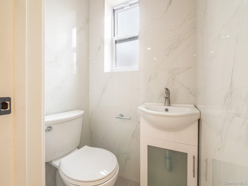 A fully renovated corner brick home at 2134 Hendrickson, where - photo 11
