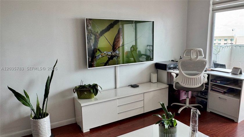 Discover sophistication in this exclusive 2-bedroom, 2-bathroom - photo 11