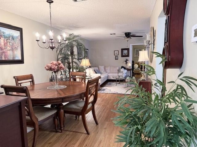 CONDO BEAUTIFUL!! This partially furnished end condo is updated - photo 3