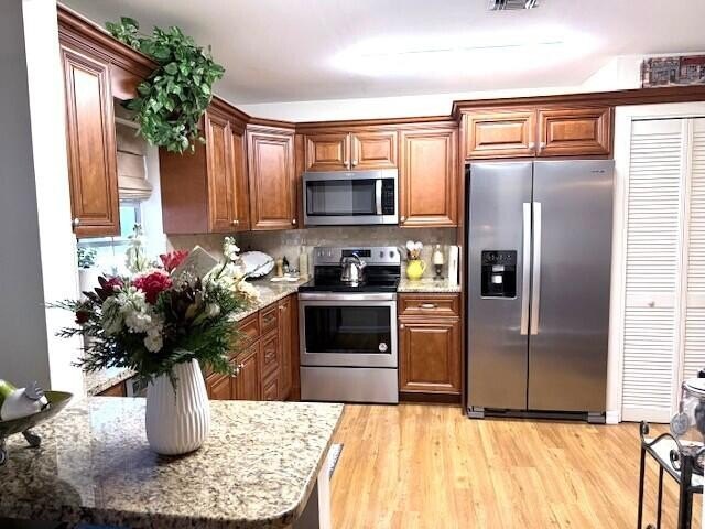 CONDO BEAUTIFUL!! This partially furnished end condo is updated - photo 7