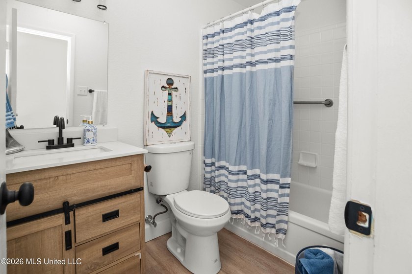Welcome to a beautifully renovated 4-bedroom, 2-bath residence - photo 19
