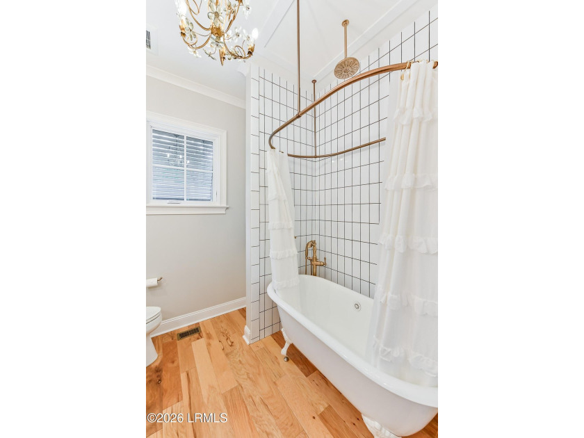 Nestled in the heart of Habersham, this exceptional home offers - photo 33