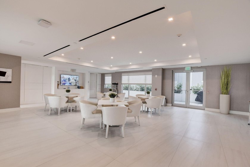 Experience refined townhouse-style living in the heart of - photo 11