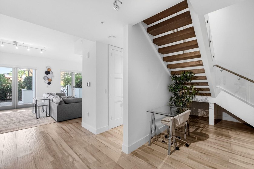 Experience refined townhouse-style living in the heart of - photo 22