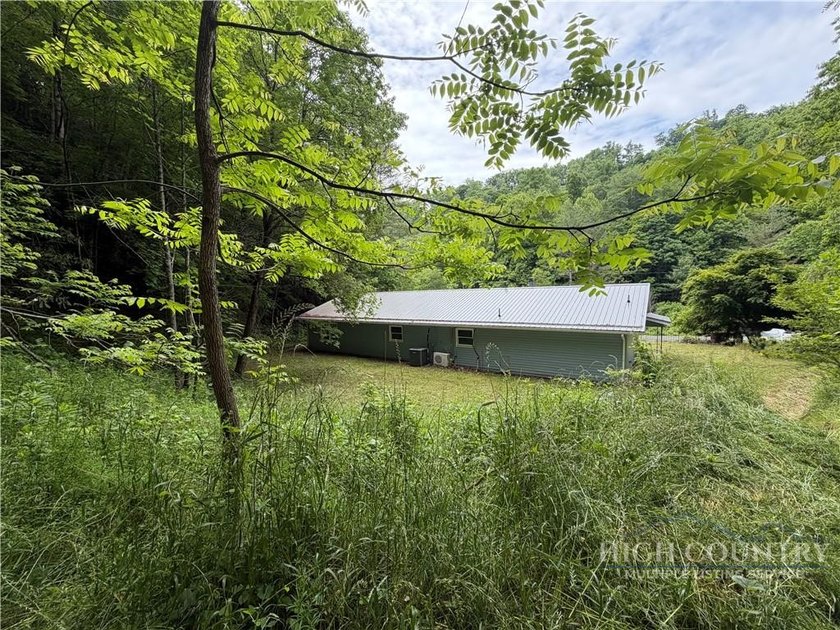 PRICE IMPROVEMENT! HOME AND 8 UNRESTRICTED ACRES! MOTIVATED - photo 8