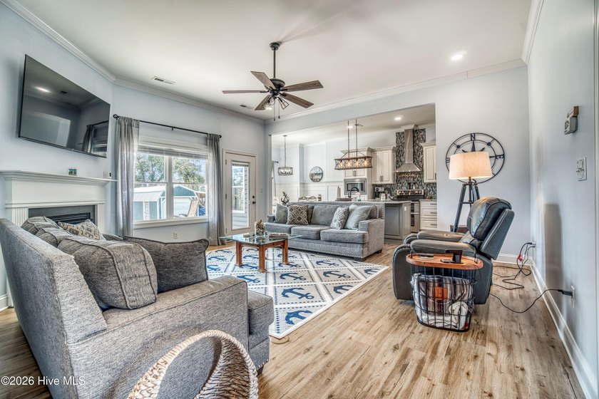 Welcome to 266 Ennett Lane--an impressive waterfront retreat in - photo 3