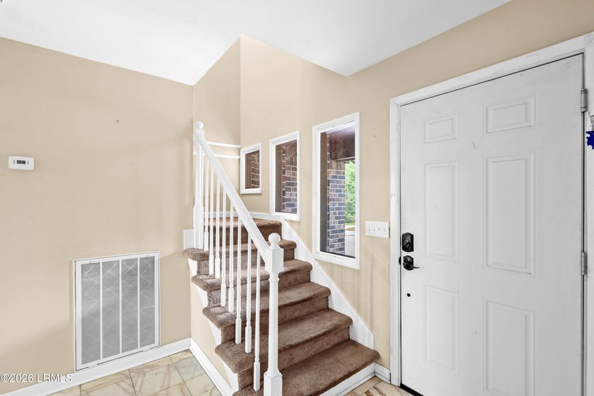 A perfect blend of waterfront serenity and everyday comfort - photo 12