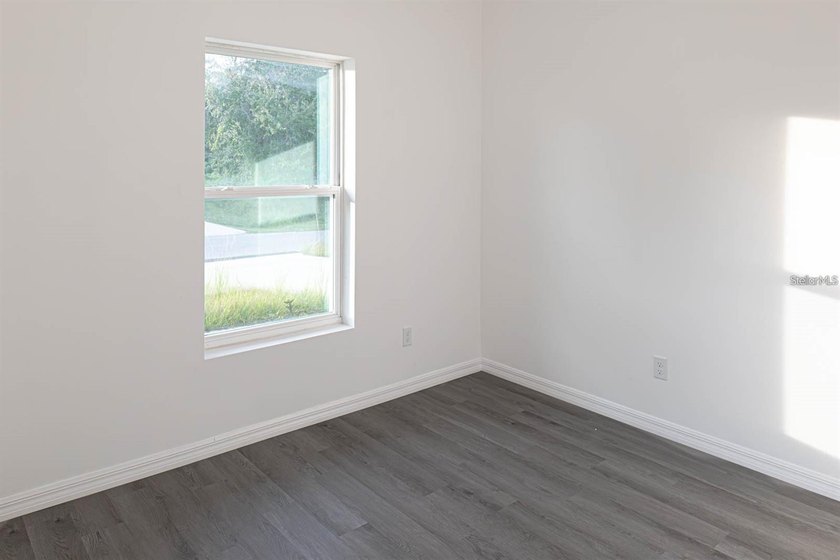 Built in 2023, this beautifully maintained 4-bedroom, 2-bath - photo 11