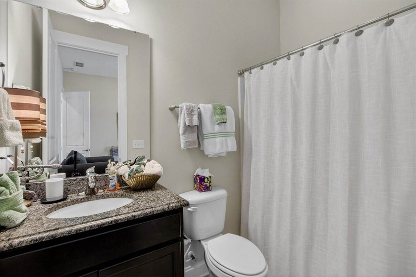 Welcome to this beautifully maintained 4 bedroom, 3.5 bath home - photo 12