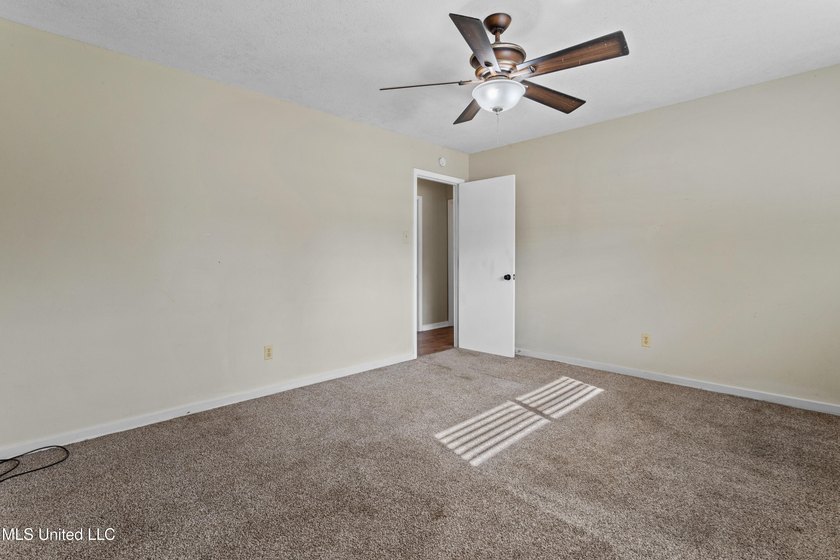 This well-maintained 4-bedroom, 2-bath brick home is situated on - photo 27