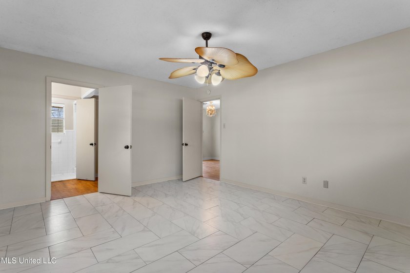 This well-maintained 4-bedroom, 2-bath brick home is situated on - photo 29