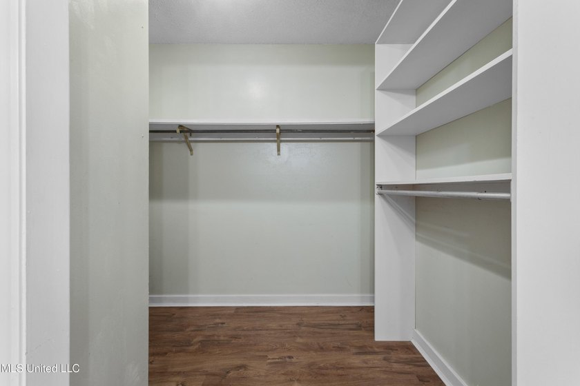 This well-maintained 4-bedroom, 2-bath brick home is situated on - photo 32