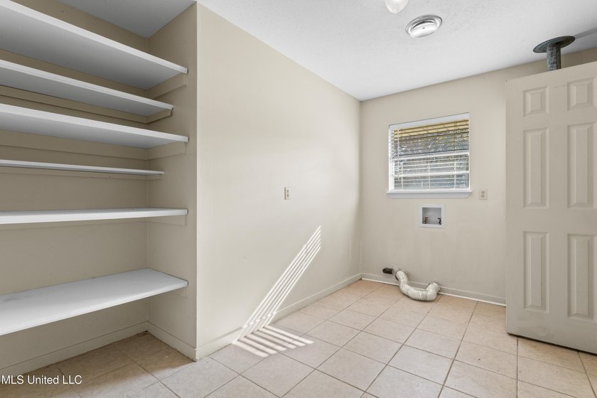This well-maintained 4-bedroom, 2-bath brick home is situated on - photo 34