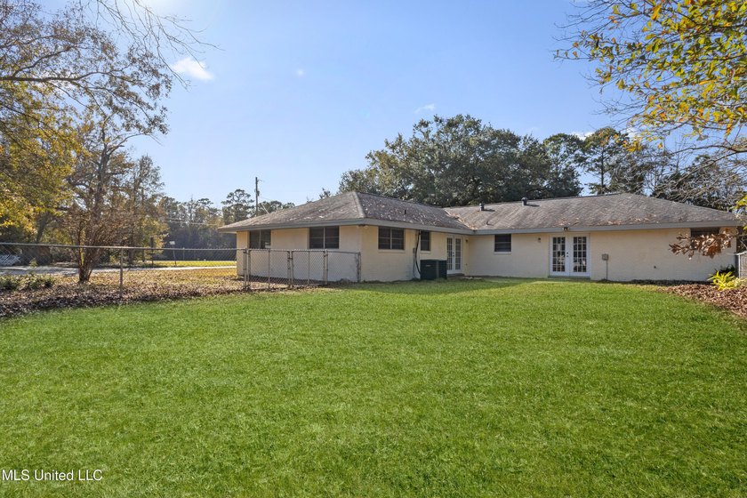 This well-maintained 4-bedroom, 2-bath brick home is situated on - photo 36