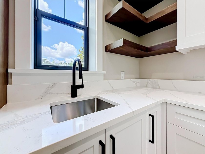 Virtually Staged. Luxury Custom Estate Home in Blue Spring - photo 32