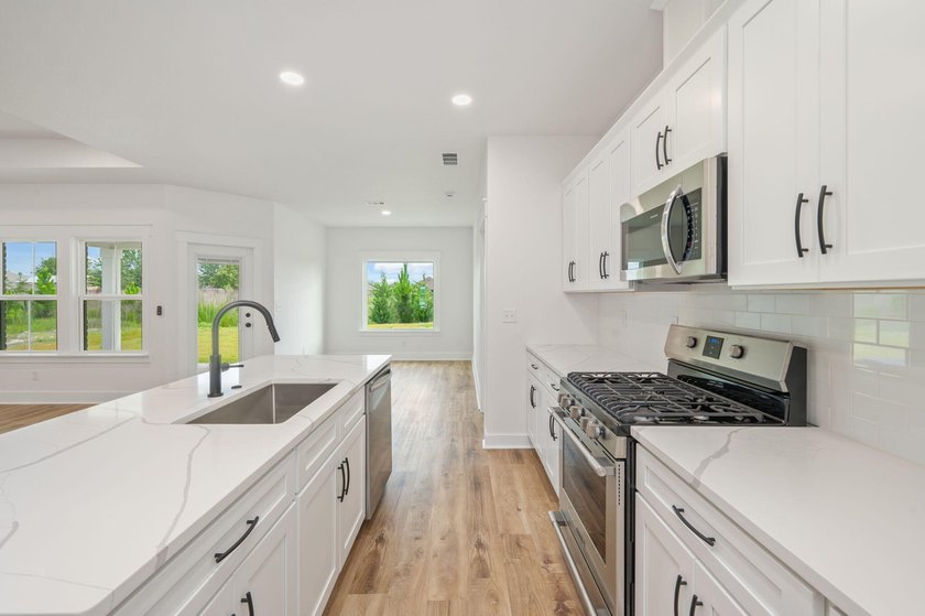 New construction 3BR/2BA home in Game Farm subdivision featuring - photo 14