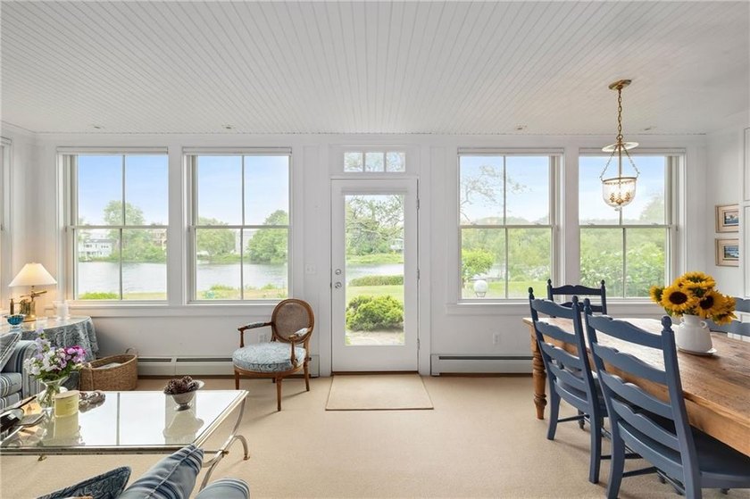 Perched at the water's edge, 19 Teal Drive is a custom-built - photo 18